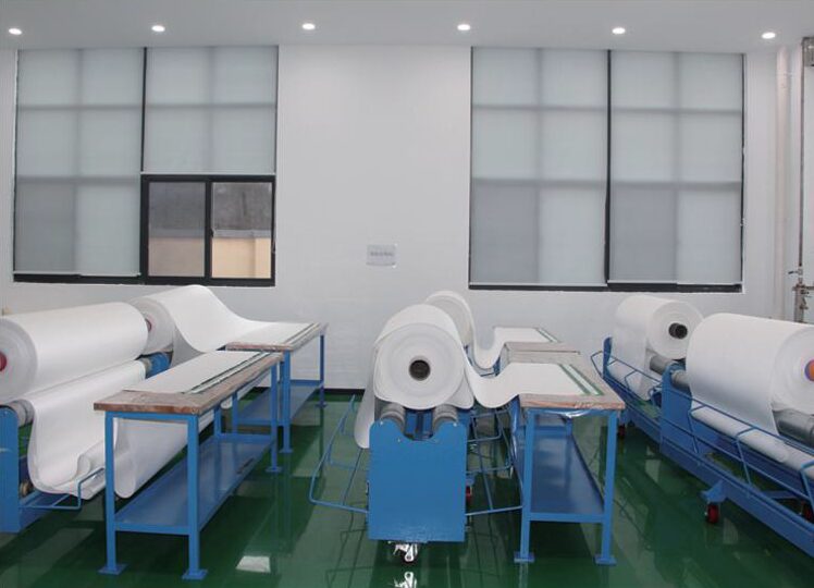 Brush-coating station with finished rolls