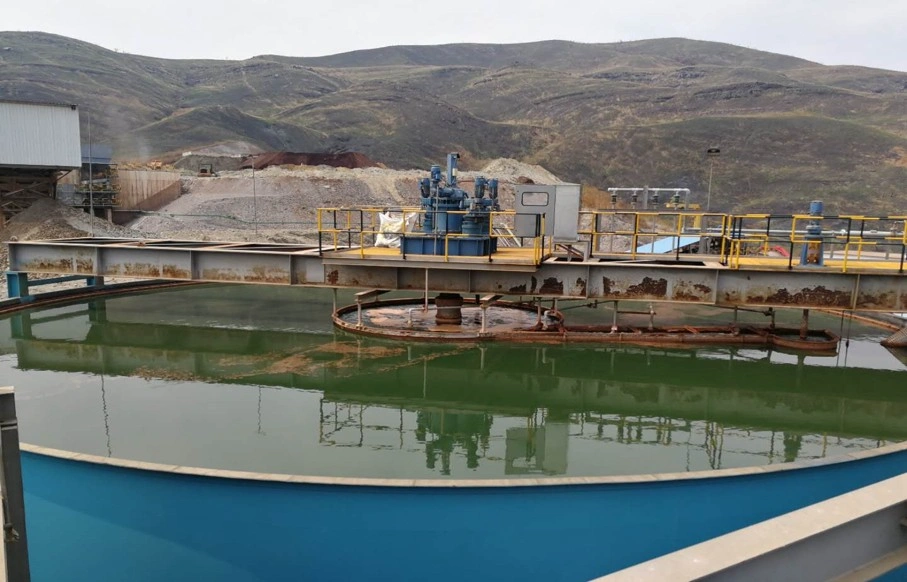 Thickener in Mineral Processing Plant Amid Mountainous Mining Terrain